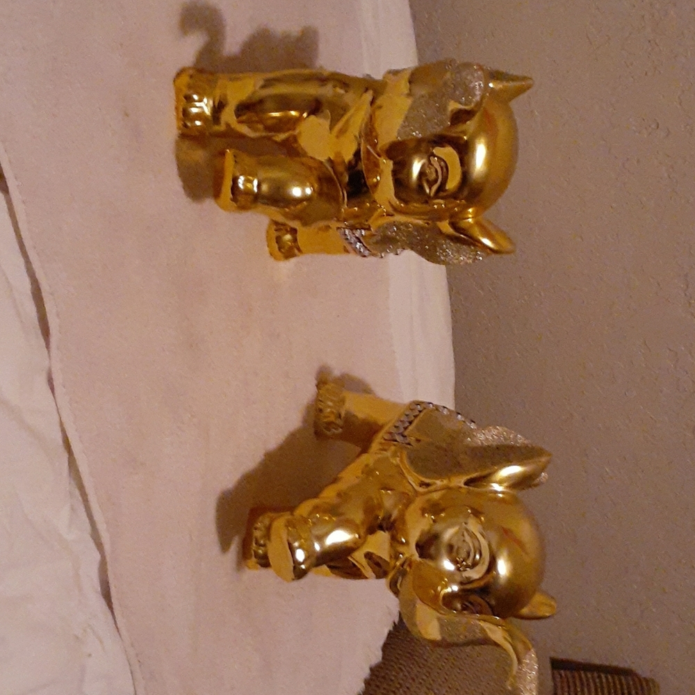 Two gold elephants